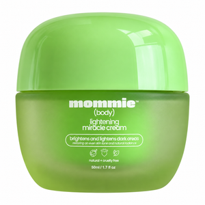 Mommie Lightening Miracle Cream green jar on a white background